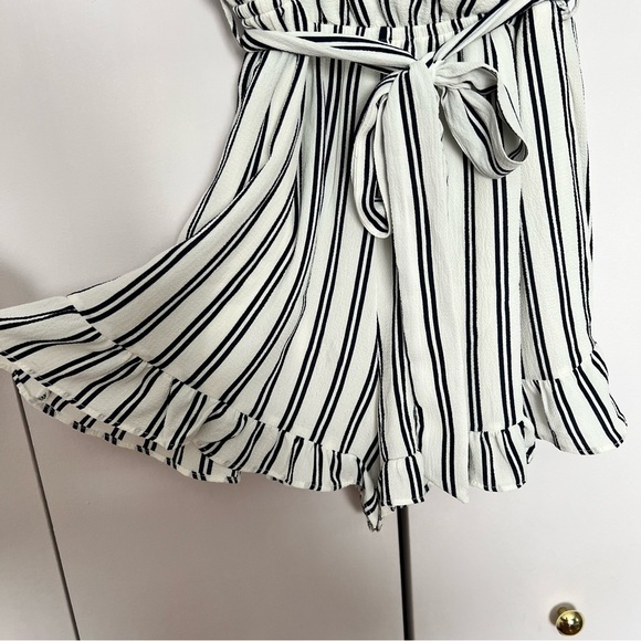 White and black striped shorts romper with ruffle detail - Picture 9 of 12